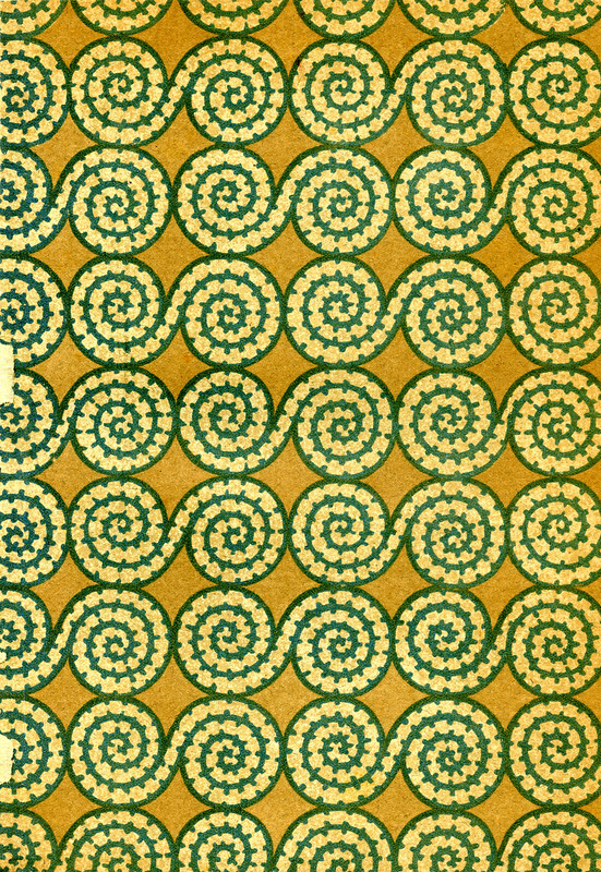 a green spiral pattern from a book end paper