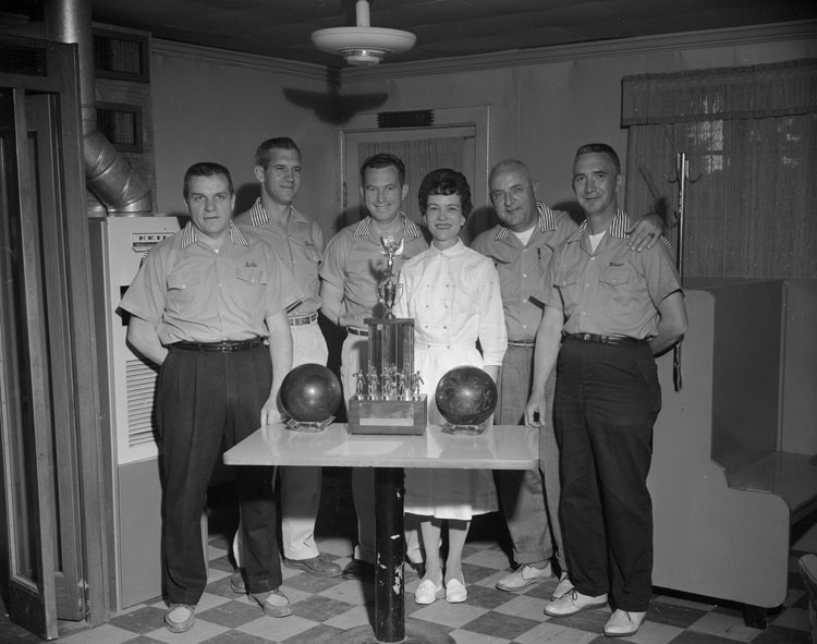 Bowling team and their trophies
